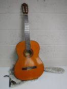 An Antoria acoustic guitar in bag
