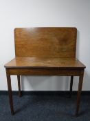 A George III mahogany turnover top tea table,