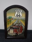 A wooden Route 66 sign
