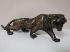 A bronze figure of a tiger