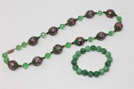 A Venetian glass necklace, together with a jadeite bracelet.