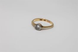 An 18ct gold diamond solitaire ring, approximately 0.