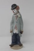 A Lladro figure - Clown with violin CONDITION REPORT: In good condition with no