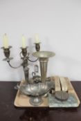A tray of 20th century plated wares including basket, ash tray, sauce boat on stand, candelabra,
