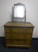 An antique pine dressing chest