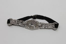 Superb quality Lady's platinum cocktail watch set with approximately 2.