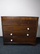 A Georgian mahogany five drawer chest