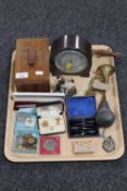 A tray of Bakelite mantel clock, brass car horn, drawing instruments, coins, medal,