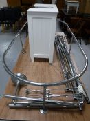 Two ceramic toilets with cisterns and seats, bidet, wall mounted sink with mixer tap, sink cabinet,