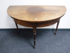A George III d-shaped mahogany hall table, width 106cm.
