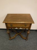 A William and Mary style single drawer side table