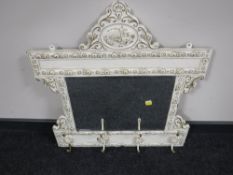A 20th century cream and gilt mirrored coat rack of Dutch design