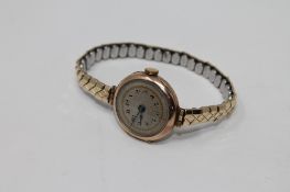 A vintage lady's 9ct gold cocktail watch on expanding bracelet