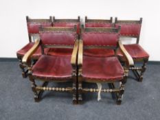 A set of six carved oak red leather upholstered dining chairs CONDITION REPORT: All