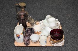 A tray of wall plates, commemorative mugs, brass and copper embossed jug,