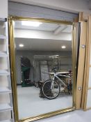 A large decorative gilt framed mirror, approx.