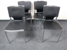 A set of four black leather and chrome Danish Danform dining chairs