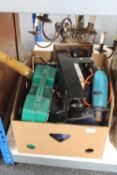 A box of power tools, beer pumps,