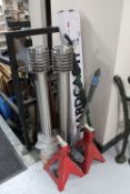 A pair of stainless steel drive way lights, pair of axle stands,