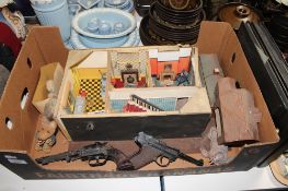 A box of vintage toys including mid twentieth century part dolls house,