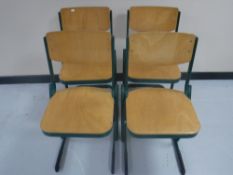 A set of four mid 20th century metal framed school chairs