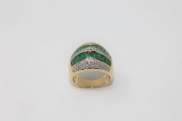 An emerald and diamond ring,
