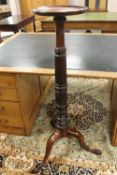A Victorian mahogany torchere