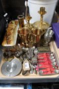 A tray of assorted brass ware, plated items, six Thai teaspoons,
