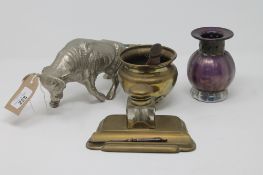 A small brass desk stand together with a small brass planter,