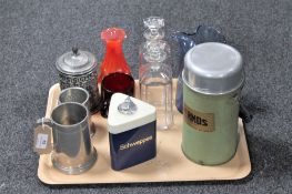 A tray containing tankards, vintage thermos flask, Schweppes table lighter, cranberry glass mug,