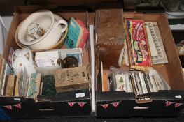 Two boxes of vintage first aid box, postcards, cigarette cards, china, mid 20th century books,