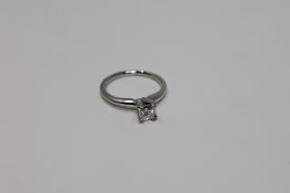 A white gold square cut diamond solitaire ring, size J, approximately 0.5ct.