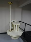 A contemporary cream coffee table, matching nest of two tables,