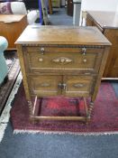 An oak barley twist gramophone cabinet