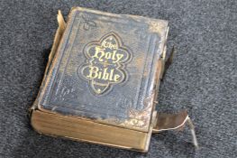 A leather bound illustrated family Bible
