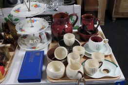 A tray containing three pieces of Torquay pottery, Carlton ware tea service and trio,