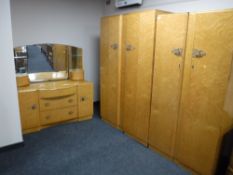 A three-piece mid 20th century Maple bedroom suite