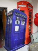 Two large cut outs - A police public call box and a British red telephone box