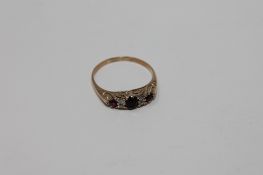 An antique ruby and diamond ring, size M, 2g.