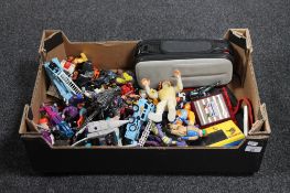 A box of action figures, Transformers, Grandstand Crazy Kong and Flyer BMX, Mario Bros.