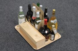 A tray of eleven bottles of assorted spirits and wines - Cased bottle of 2007 Les Geranges Des
