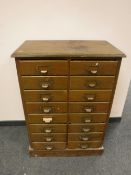 An early twentieth century sixteen drawer index chest CONDITION REPORT: Top poor.