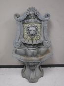 A lion mask fountain