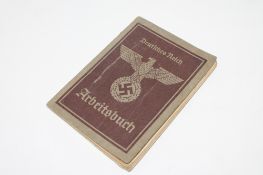 A German Third Reich Arbeitsbuch containing various official stamps