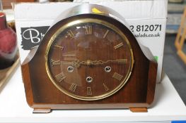A walnut cased Smiths mantel clock