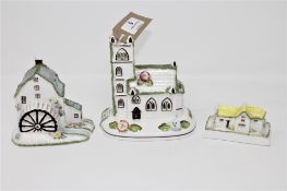 A Coalport Village Church pastille burner together with two Coalport bone china figures;