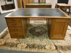 A late Victorian oak partners desk CONDITION REPORT: Cabinet on one side is locked