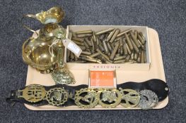 A tray of assorted brass ware,