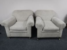 A pair of early 20th century lady's and gents armchairs