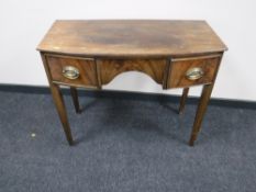 A Victorian mahogany bowfronted side table fitted two drawers